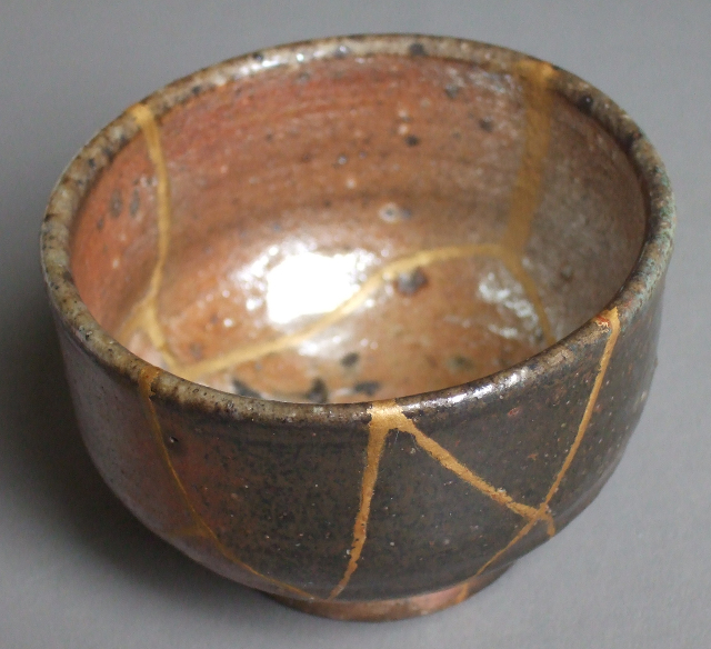 A bowl that has been repaired with gold lacquer