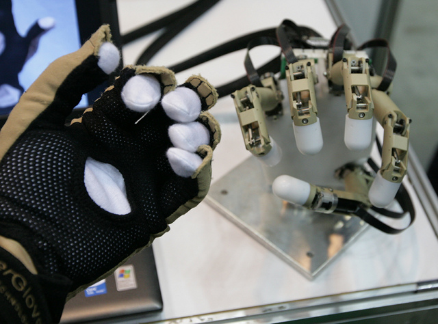 A human-like robot hand and glove used to control it