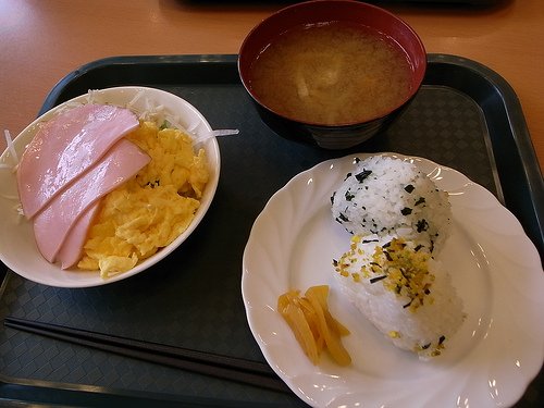 Rice-balls, miso soup, ham and egg