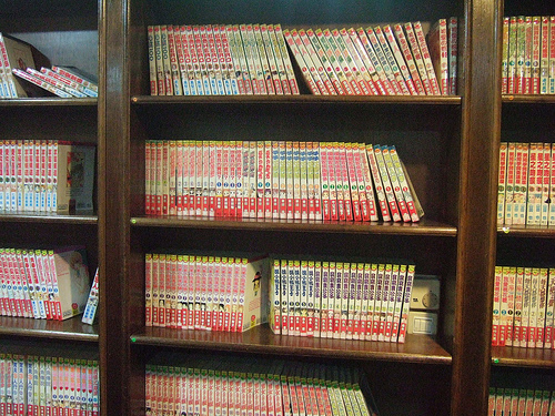 Shelves of comic books in a Manga Kissa